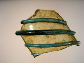 Pottery neck fragment with applied decoration 